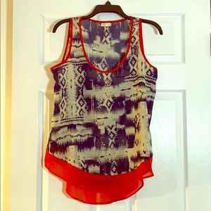 Sheer patterned sleeveless tunic